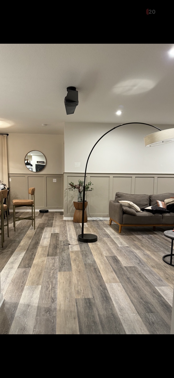 Half-height board and batten living and dining room by The Worksmith Accents